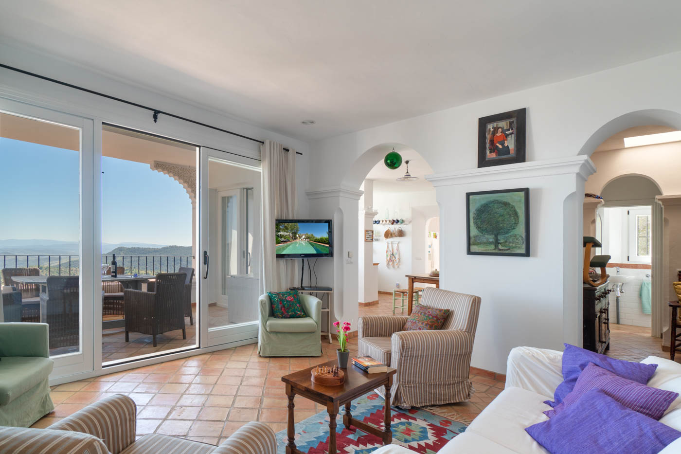 Lounge with doors opening to terrace