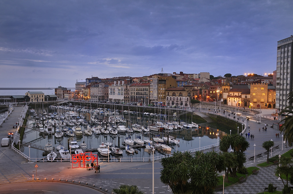 The coastal city of Gijon at night