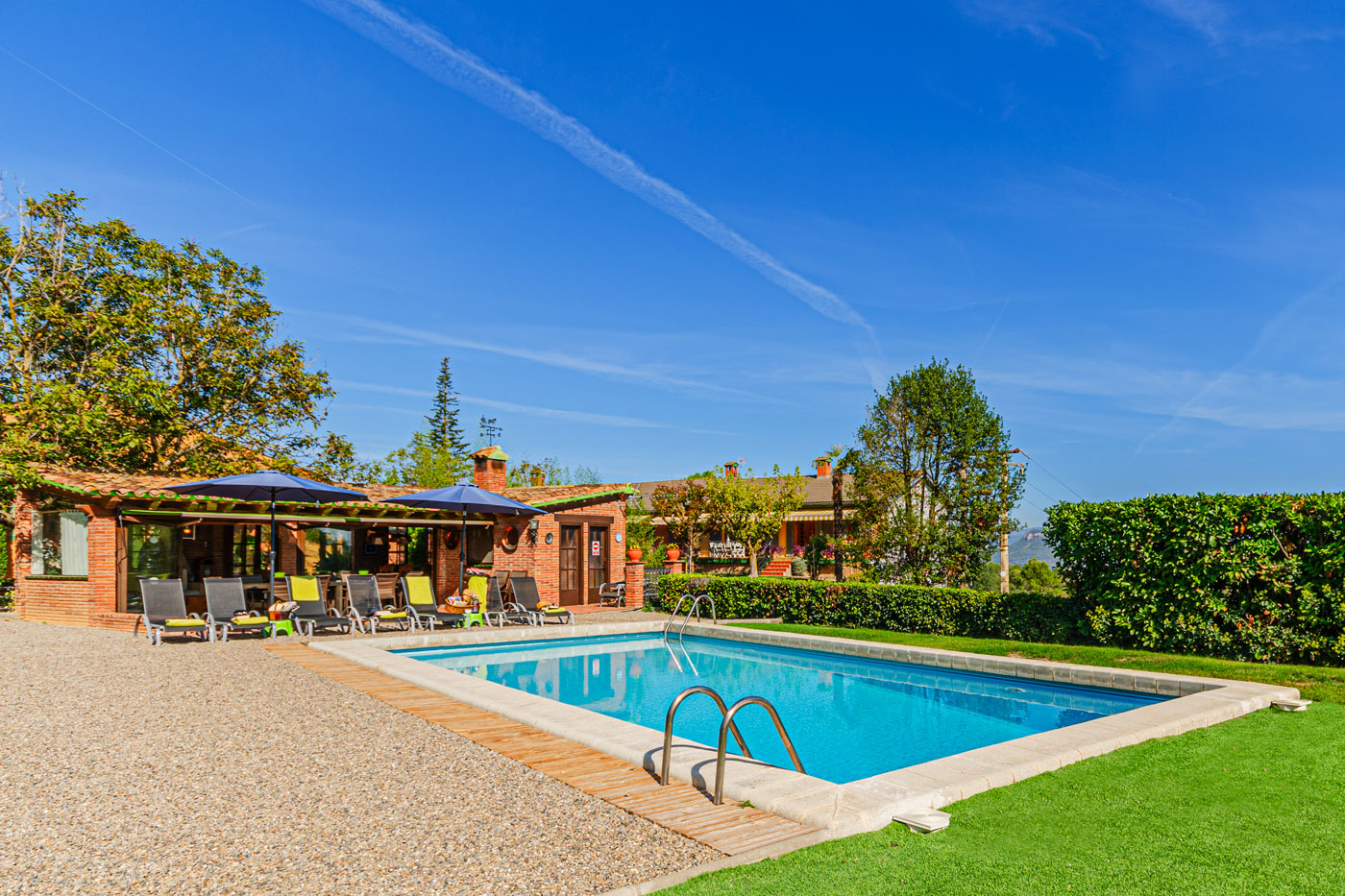 Pool, pool house, and your villa directly behind