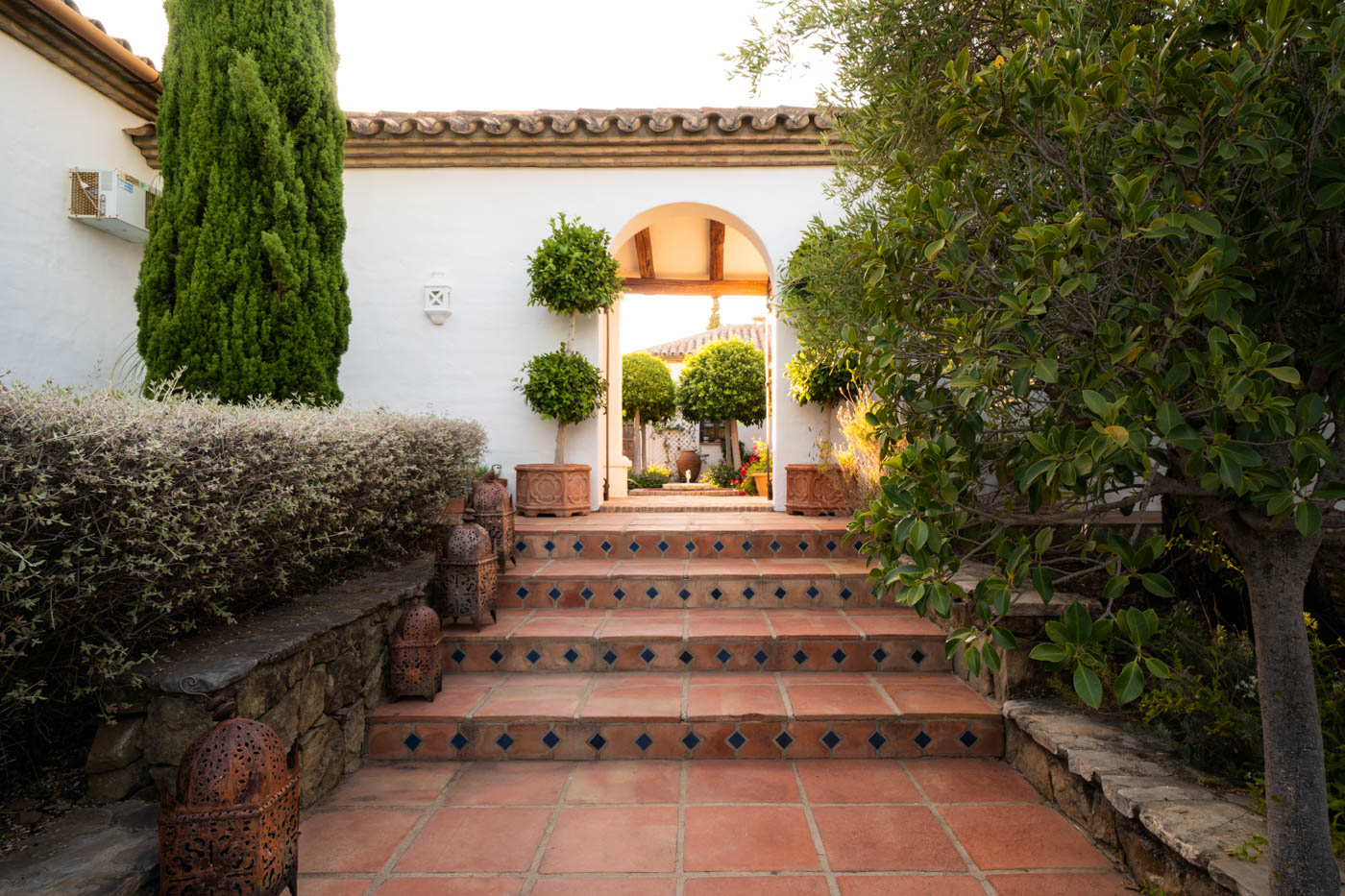 Steps lead onto beautiful courtyard 