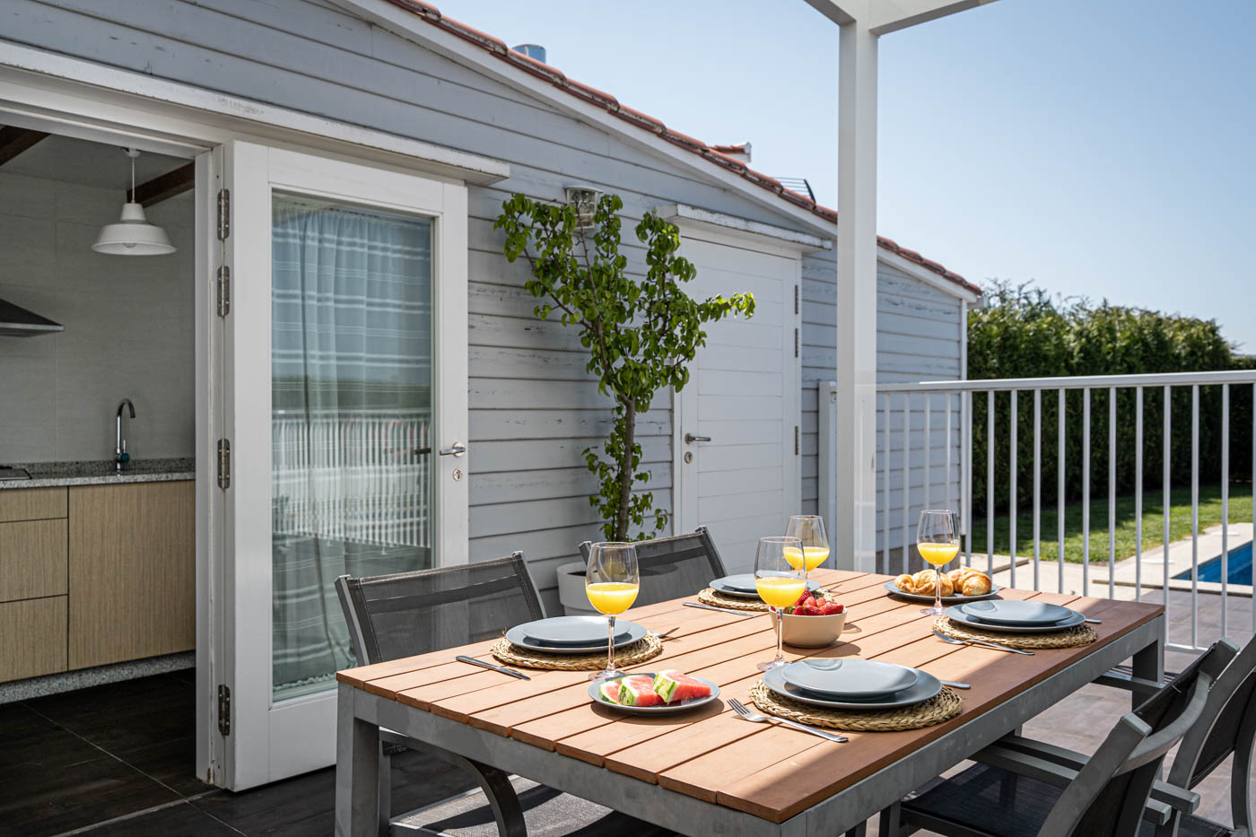 Outdoor living includes an additional outdoor kitchen