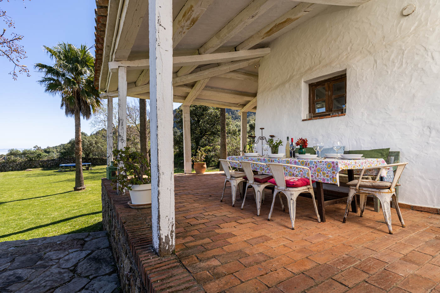 The terrace along the house has an unprotected drop