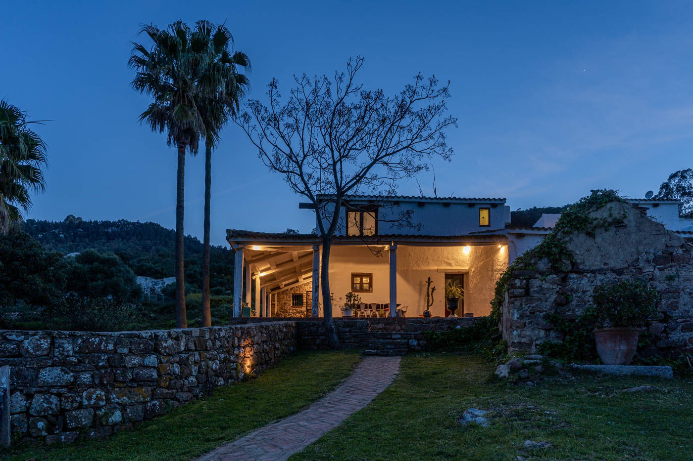 Path from pool area to the house at night time