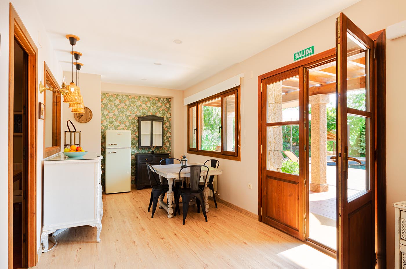 Kitchen/dining area with doors to furnished porch
