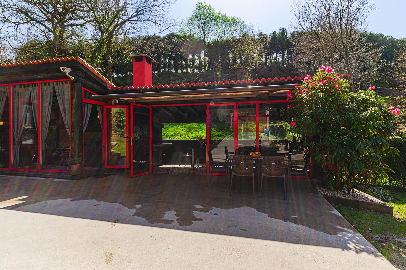 Patio and covered outdoor living area and barbecue area