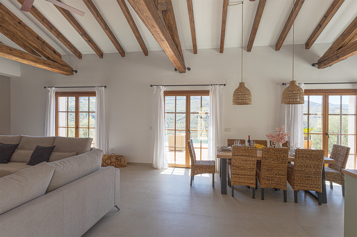 Large French windows opening to terraces