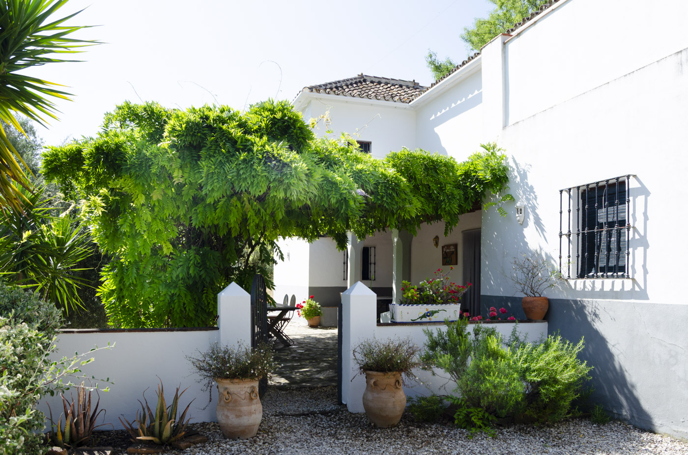 Entering your villa via traditional patio 