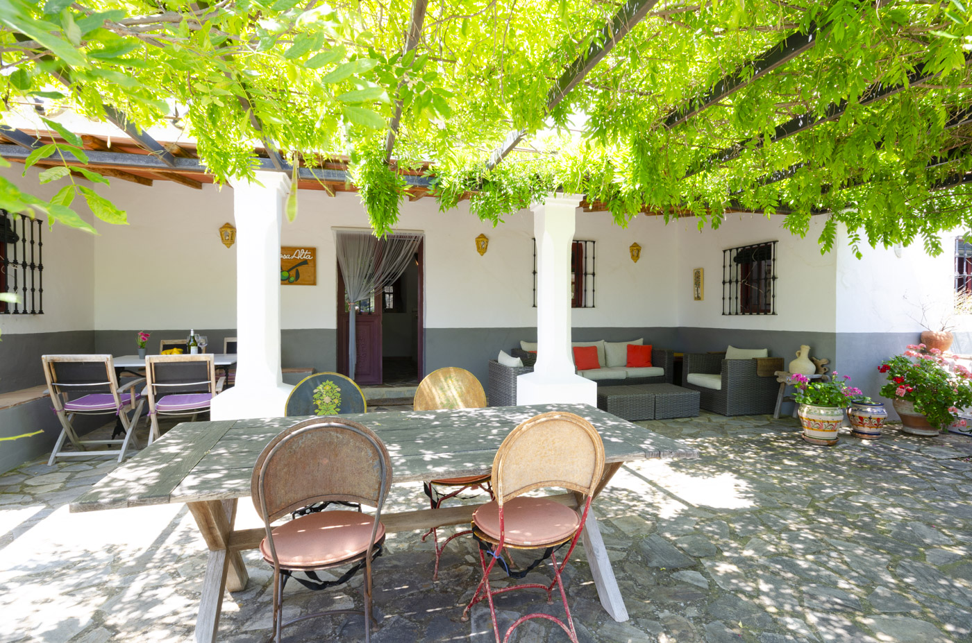 Front furnished patio with pergola