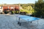 Traditional grain storage square with basket and table tennis  