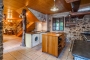 Kitchen area with washing machine and central isle