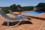 Sunbathe by the pool
