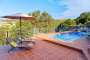 Heated swimming pool and sun loungers