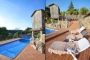 Heated swimming pool and sun loungers