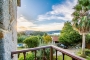 View from the Villa to the garden, summer house and pool