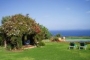 Looking out to pool area and sea in distance