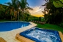 Outdoor heated pool with jacuzzi