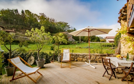 Timber deck by lawned gardens