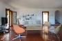 Living space with french doors opening to terraces