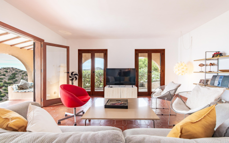 Living areas are bright with doors to terraces