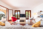 Living areas are bright with doors to terraces