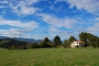 Open countryside with grazing fields around