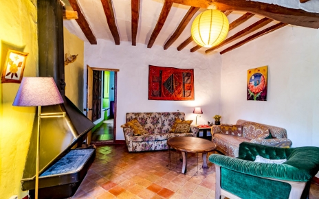 Lounge leads to double bedded room