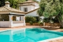 Poolside kitchen and villa