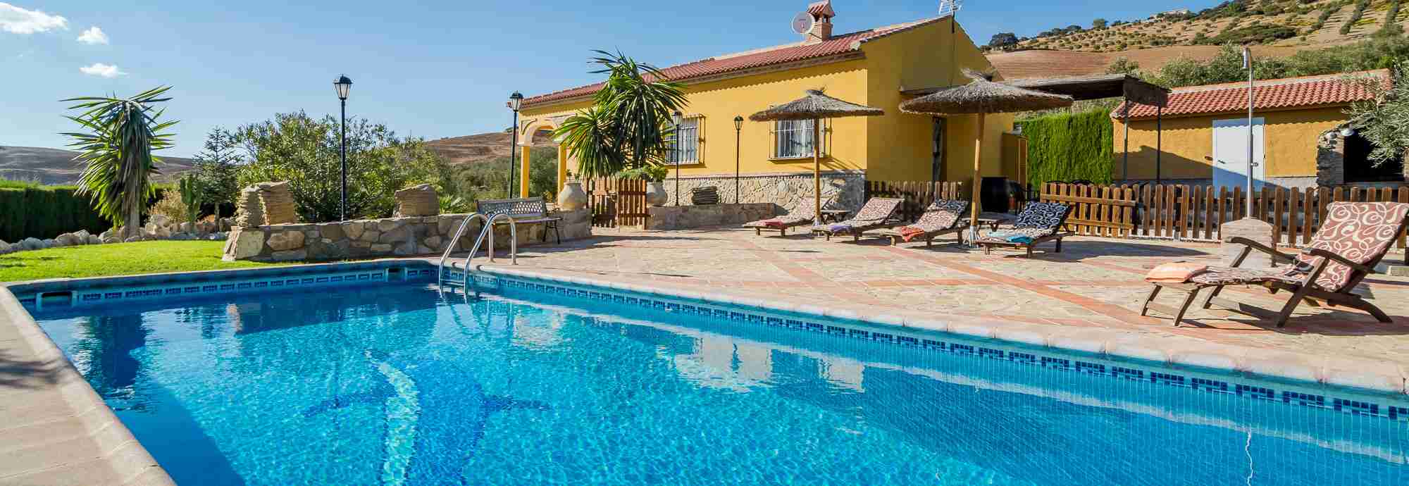 Sunny private villa in Andalusia among olive trees and wild rock formations 