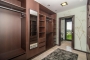 Walk-in dresser in master bedroom