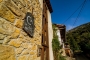 Standing by the cottage´s main door