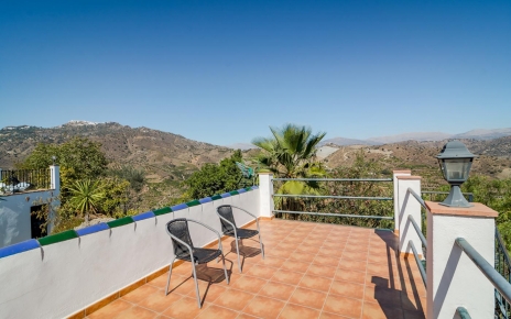 Roof terrace with pool area behind