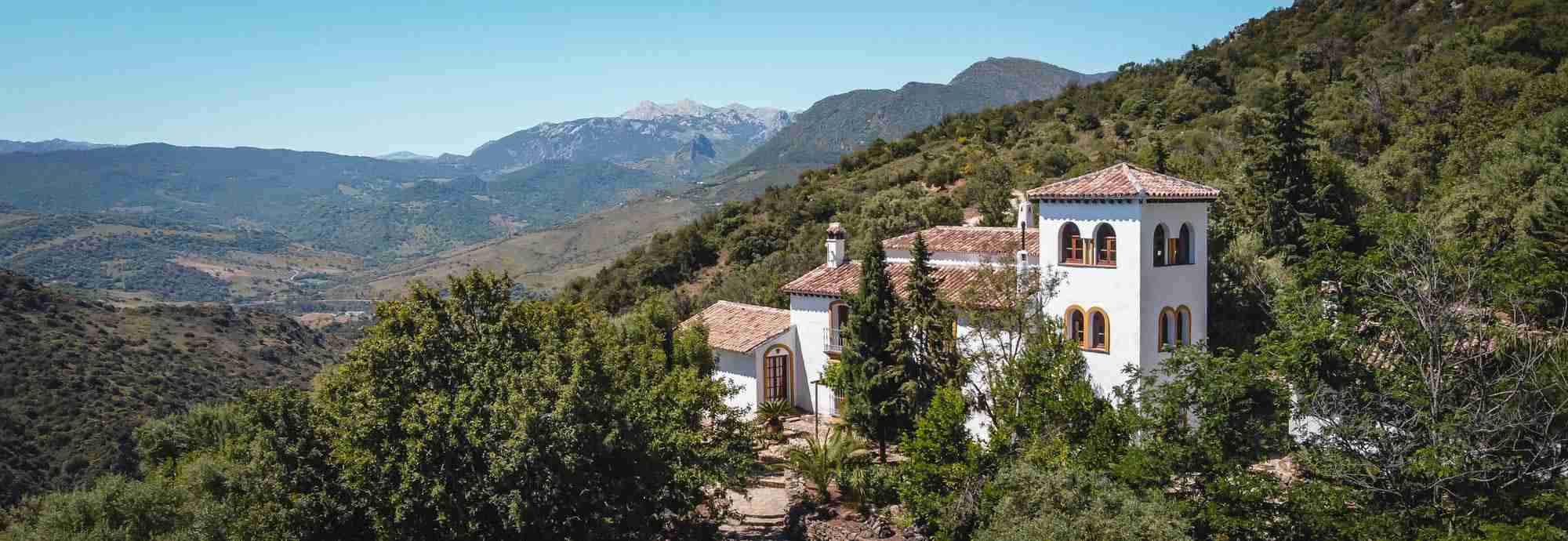 Traditional Andalusian cortijo in natural parkland with large pool