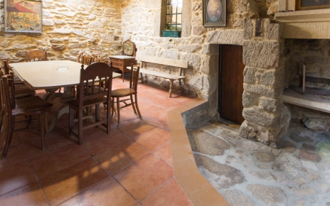 Indoor barbecue area also with dining table
