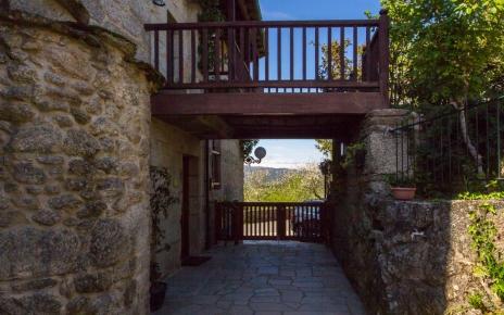 Lower patio and mid level access to gardens