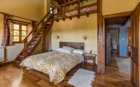 Double bedded room with a gallery room