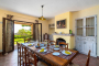 Dining area with doors opening to terraces