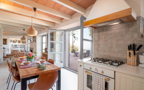 Dining area opening to furnished terraces