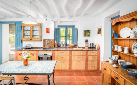 Kitchen with doors to furnished terraces
