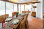 Dining area opening to terraces and pool area