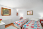 2 bed casita above pool has one twin bedded room