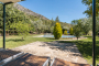 Pérgola, jardines y piscina