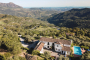 Villa setting with the Mediterranean sea as backdrop