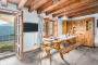 Open plan kitchen / dining area with doors to garden