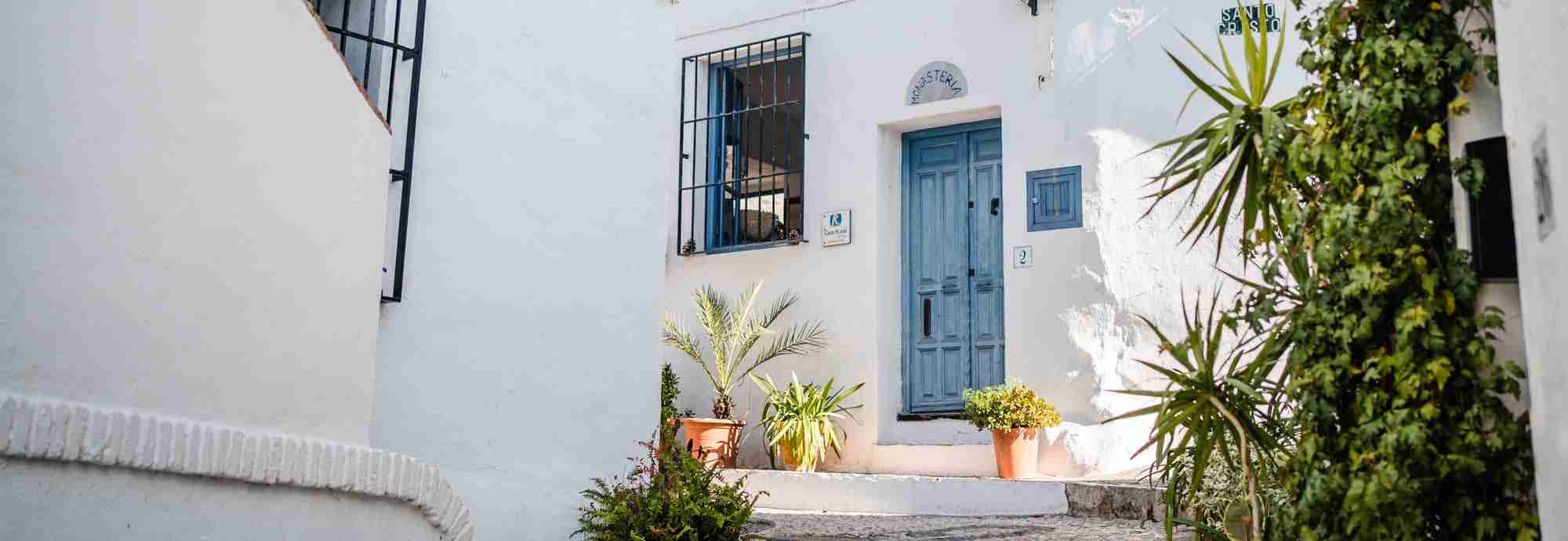 House with small garden in the high quarters of picture-book village