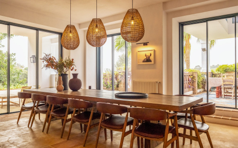 Main dining area with doors to terraces