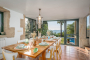 Dining area with doors to gardens