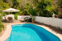Private pool with your holiday cottage just behind 