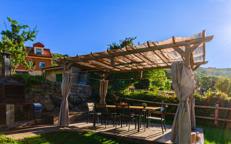 Pergola with outdoor dining facilities