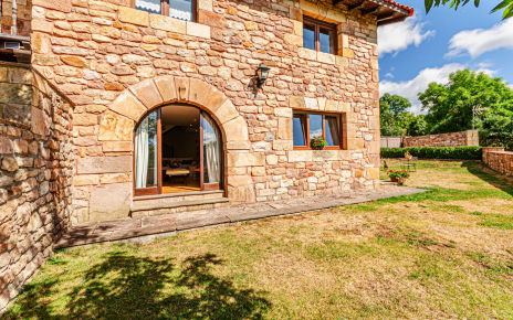 Doors to gardens from living/dining area