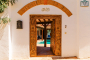 Entrance through an old restored Moroccan door